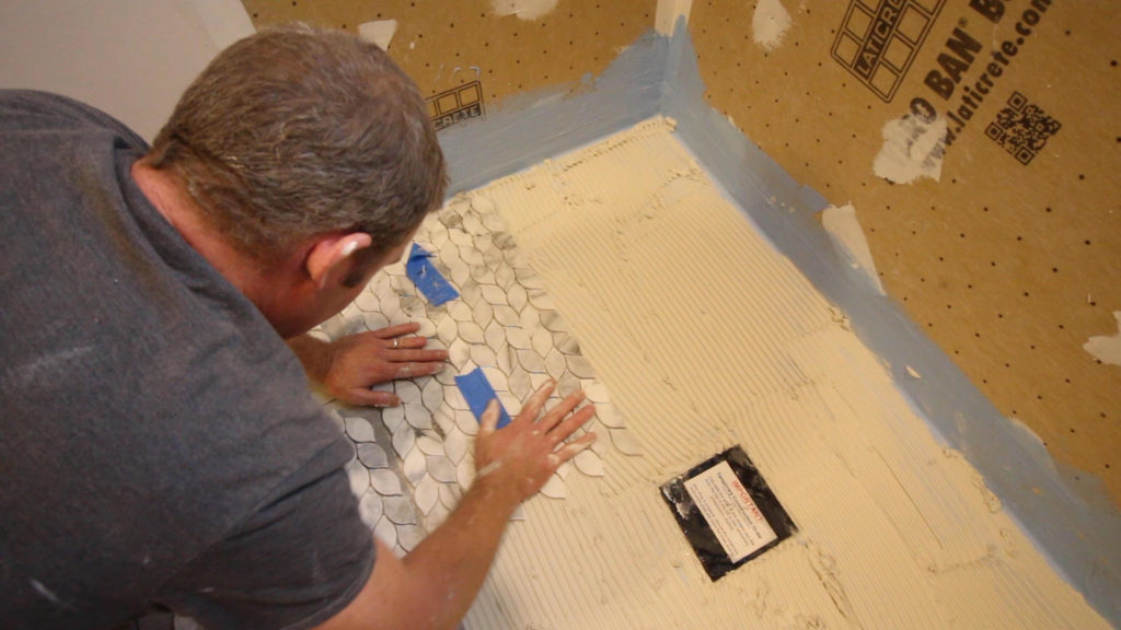 Setting Shower Pan Tile - Bathroom Repair Tutor