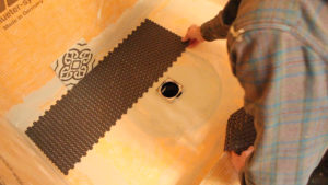 Schluter Shower Pan with Black Penny Mosaic